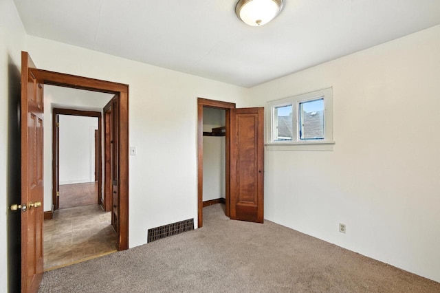 6222 W Locust St Unit 6224, Milwaukee, WI 53210 - unfurnished bedroom featuring carpet flooring and a closet