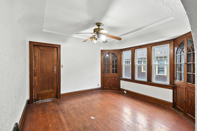 6222 W Locust St Unit 6224, Milwaukee, WI 53210 - unfurnished room featuring a textured wall, dark wood-style floors, and ceiling fan