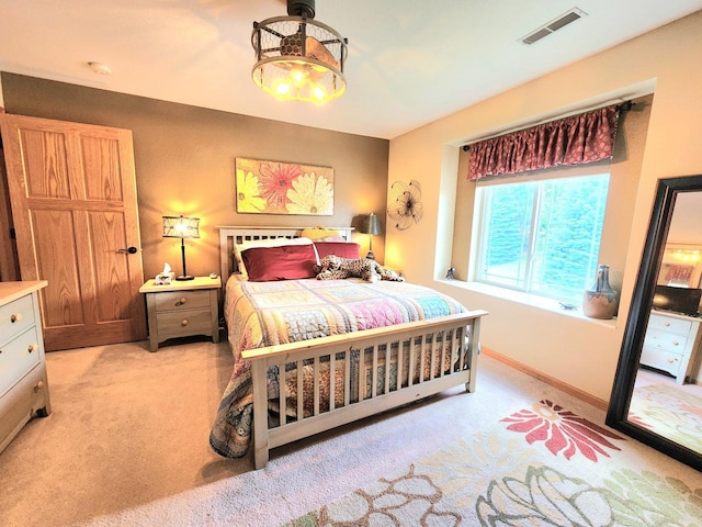 4023 Hazelnut Ct, Sheboygan, WI 53081 - bedroom with light carpet and baseboards