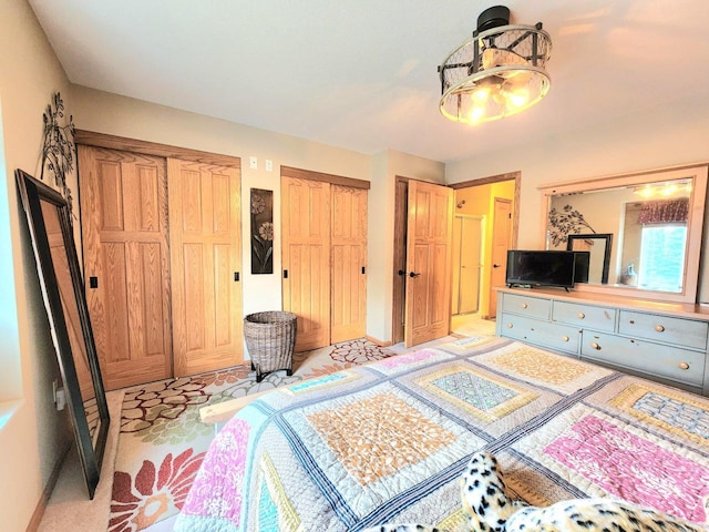 4023 Hazelnut Ct, Sheboygan, WI 53081 - bedroom with multiple closets and light colored carpet