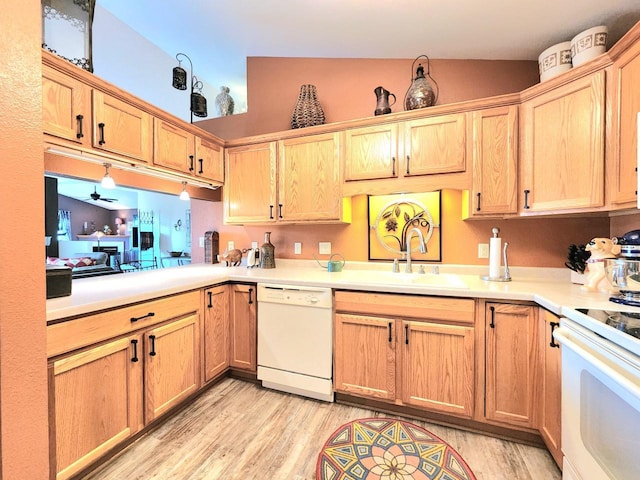 4023 Hazelnut Ct, Sheboygan, WI 53081 - kitchen featuring white appliances, light wood-style floors, light countertops, and ceiling fan