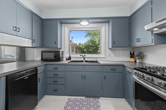 2015 E College Ave, Appleton, WI 54915 - kitchen with black appliances, ventilation hood, and tasteful backsplash