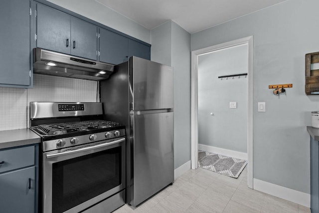 2015 E College Ave, Appleton, WI 54915 - kitchen featuring under cabinet range hood, appliances with stainless steel finishes, and tasteful backsplash