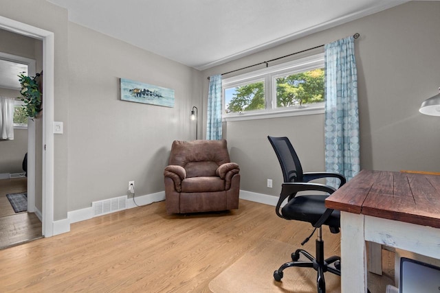 2015 E College Ave, Appleton, WI 54915 - home office featuring wood finished floors and baseboards