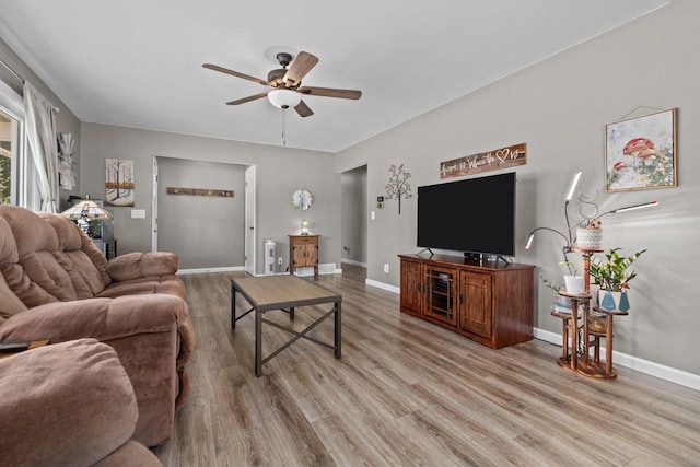 2015 E College Ave, Appleton, WI 54915 - living area with a ceiling fan and light wood-type flooring