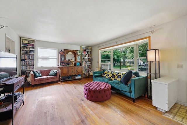 3613 Spenser Ln, Madison, WI 53704 - living room featuring wood finished floors and cooling unit