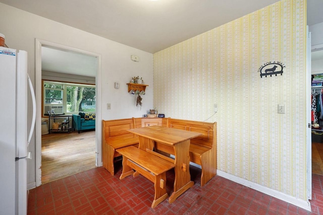 3613 Spenser Ln, Madison, WI 53704 - dining area with brick patterned flooring and baseboards