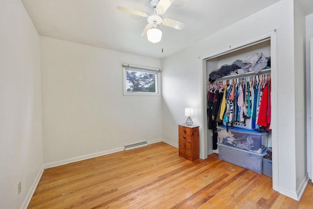 3613 Spenser Ln, Madison, WI 53704 - unfurnished bedroom featuring light wood-type flooring, a closet, and a ceiling fan