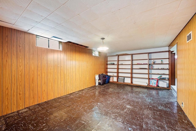 3613 Spenser Ln, Madison, WI 53704 - below grade area featuring wooden walls and plenty of natural light