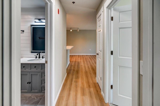 201 Kearney Way Unit 201, Waunakee, WI 53597 - hall featuring light wood-type flooring and track lighting