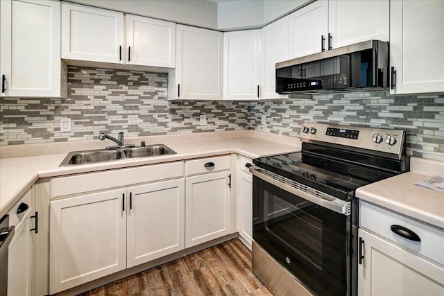 201 Kearney Way Unit 201, Waunakee, WI 53597 - kitchen with electric stove, white cabinetry, and light countertops