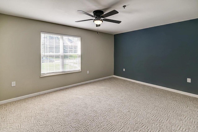 201 Kearney Way Unit 201, Waunakee, WI 53597 - empty room featuring a ceiling fan and carpet floors