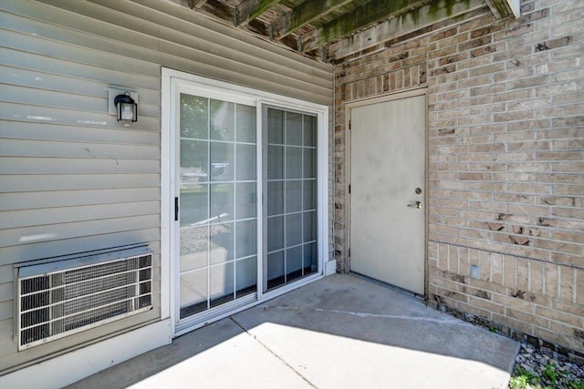 201 Kearney Way Unit 201, Waunakee, WI 53597 - doorway to property with a patio area