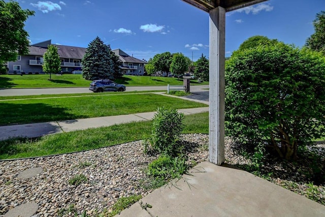 201 Kearney Way Unit 201, Waunakee, WI 53597 - view of patio with a residential view