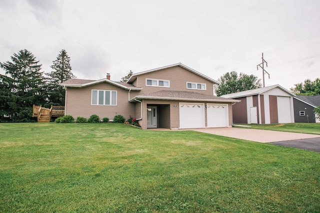 403 Bluebird Ln, Loyal, WI 54446 - tri-level home with a garage, concrete driveway, a chimney, a front lawn, and a wooden deck