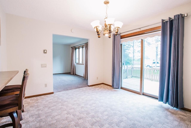 403 Bluebird Ln, Loyal, WI 54446 - unfurnished dining area with carpet and a chandelier