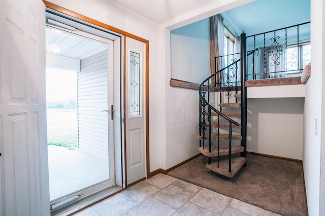 403 Bluebird Ln, Loyal, WI 54446 - foyer with stairs, healthy amount of natural light, and carpet floors