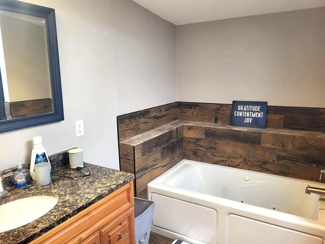 W6747 Legler Valley Rd, New Glarus, WI 53574 - bathroom featuring a jetted tub and vanity