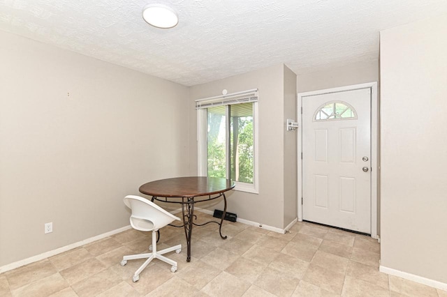9618 W Bradley Rd, Milwaukee, WI 53224 - foyer entrance featuring plenty of natural light and a textured ceiling