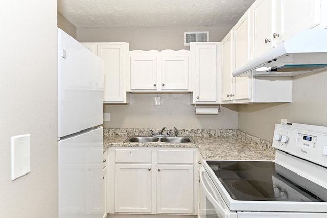 9618 W Bradley Rd, Milwaukee, WI 53224 - kitchen with white appliances, under cabinet range hood, light countertops, white cabinetry, and a textured ceiling