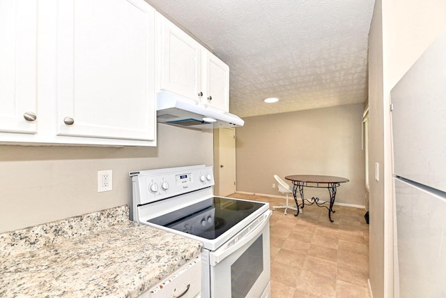 9618 W Bradley Rd, Milwaukee, WI 53224 - kitchen featuring white appliances, under cabinet range hood, white cabinets, and a textured ceiling
