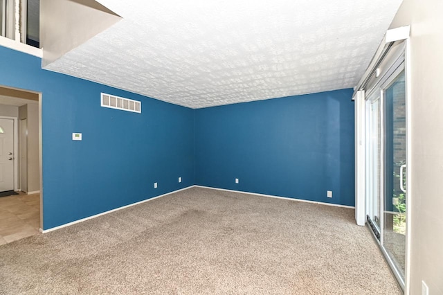 9618 W Bradley Rd, Milwaukee, WI 53224 - empty room featuring a textured ceiling and carpet floors