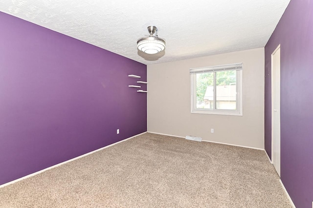 9618 W Bradley Rd, Milwaukee, WI 53224 - spare room with carpet flooring and a textured ceiling