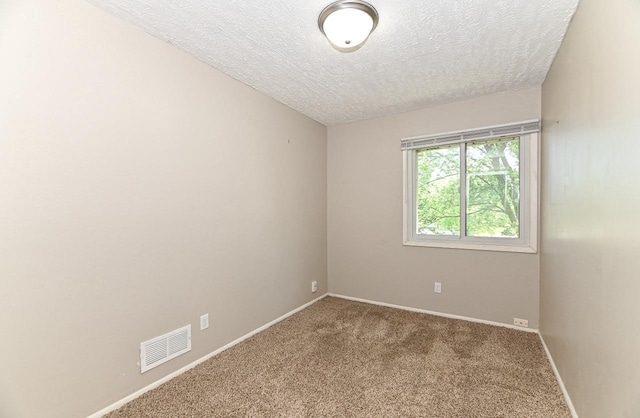 9618 W Bradley Rd, Milwaukee, WI 53224 - carpeted spare room with a textured ceiling and baseboards