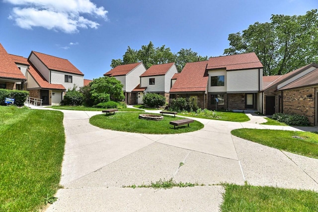9618 W Bradley Rd, Milwaukee, WI 53224 - surrounding community with a lawn, a residential view, and a fire pit