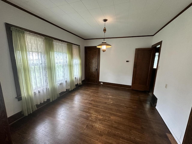 211 N Main St, Viola, WI 54664 - unfurnished dining area featuring ornamental molding and dark wood finished floors