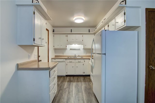 3474 Delbert Rd, Eau Claire, WI 54703 - kitchen featuring white appliances, wood finished floors, white cabinets, and light countertops
