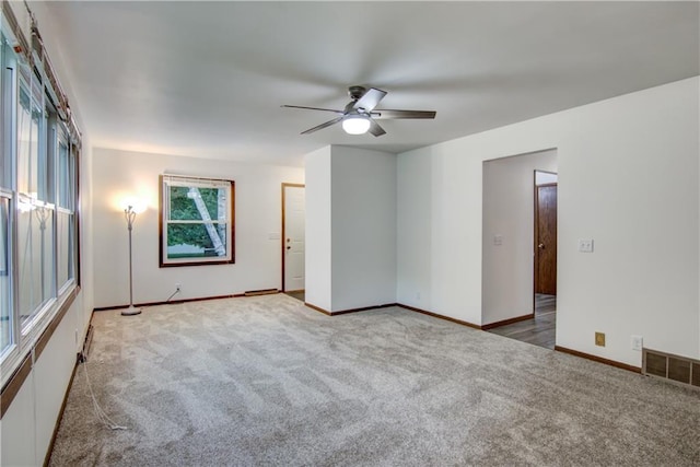 3474 Delbert Rd, Eau Claire, WI 54703 - carpeted spare room with a ceiling fan and baseboards