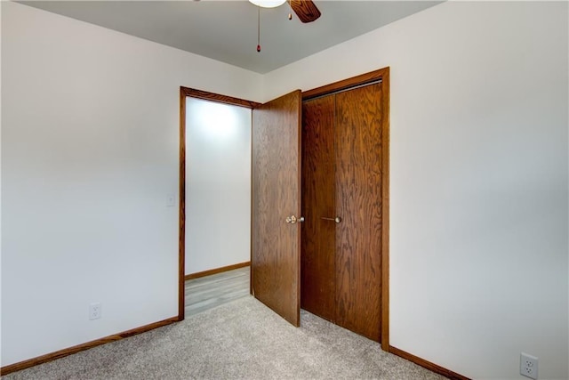 3474 Delbert Rd, Eau Claire, WI 54703 - unfurnished bedroom with carpet flooring, a closet, and a ceiling fan