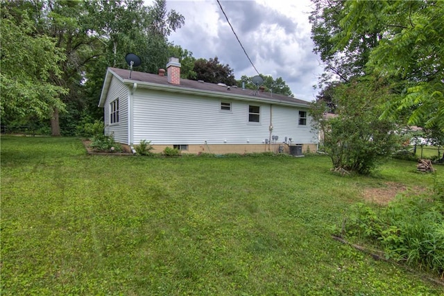 3474 Delbert Rd, Eau Claire, WI 54703 - back of property featuring a chimney