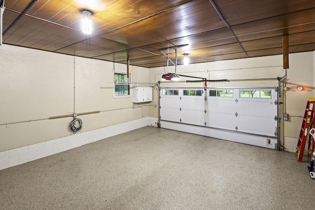 4350 S US Highway 45, Oshkosh, WI 54902 - garage featuring wooden ceiling and a garage door opener