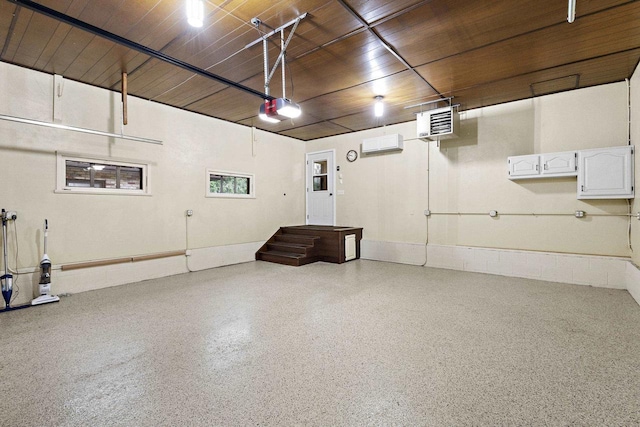 4350 S US Highway 45, Oshkosh, WI 54902 - garage featuring a garage door opener, a wall mounted AC, and wooden ceiling