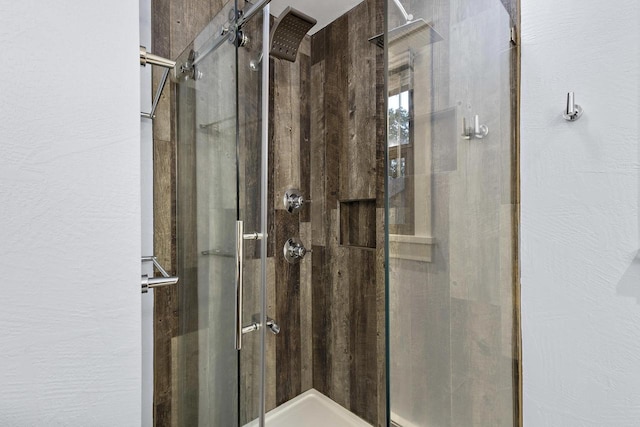 4350 S US Highway 45, Oshkosh, WI 54902 - full bathroom featuring a stall shower and a textured wall
