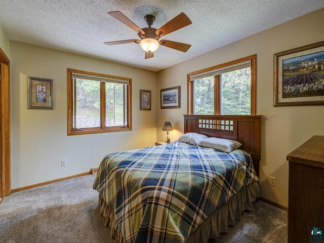 10811 S Patterson Rd, Solon Springs, WI 54873 - bedroom with carpet flooring, a ceiling fan, and a textured ceiling