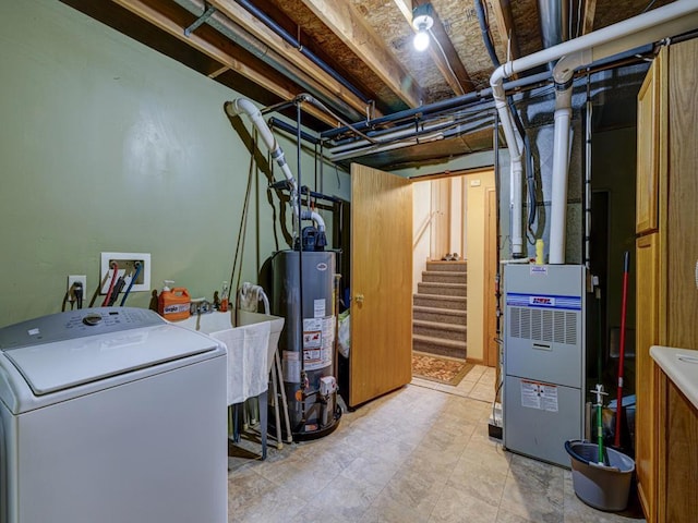 10811 S Patterson Rd, Solon Springs, WI 54873 - unfinished basement featuring washer / dryer, gas water heater, and stairway