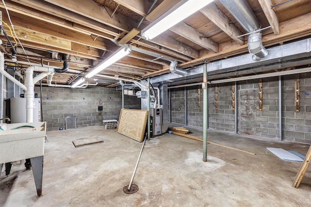 172 S Pierce St, Adams, WI 53910 - unfinished basement with heating unit and a sink