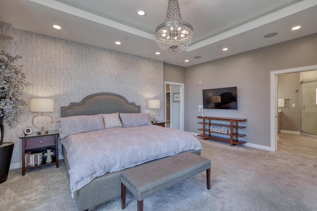 215 E Pleasant St Unit 304, Oconomowoc, WI 53066 - bedroom featuring recessed lighting, carpet flooring, a chandelier, and connected bathroom