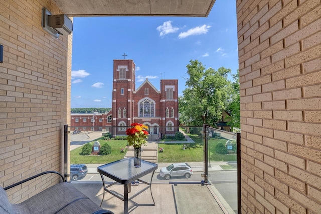 215 E Pleasant St Unit 304, Oconomowoc, WI 53066 - balcony featuring a wall unit AC