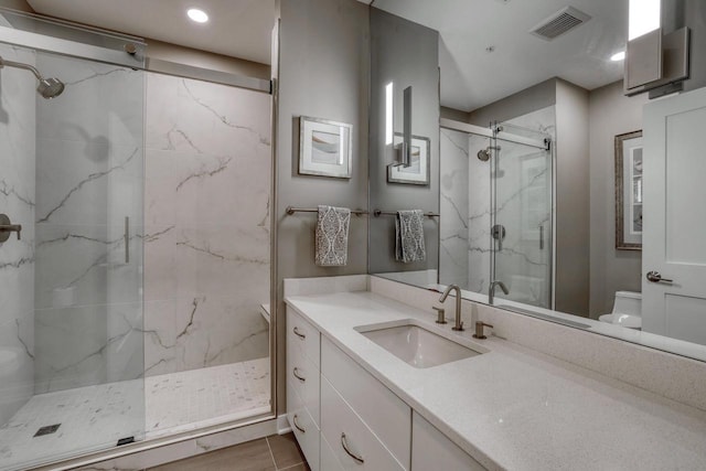 215 E Pleasant St Unit 304, Oconomowoc, WI 53066 - full bathroom with vanity, a marble finish shower, and recessed lighting