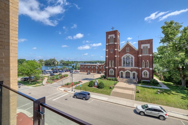 215 E Pleasant St Unit 304, Oconomowoc, WI 53066 - balcony featuring a water view