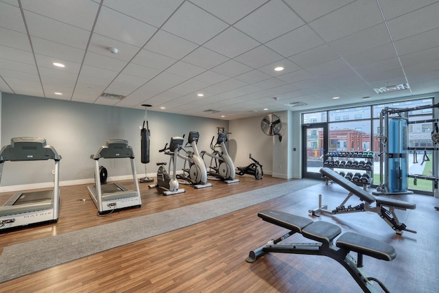 215 E Pleasant St Unit 304, Oconomowoc, WI 53066 - gym featuring wood finished floors, a wall of windows, and recessed lighting