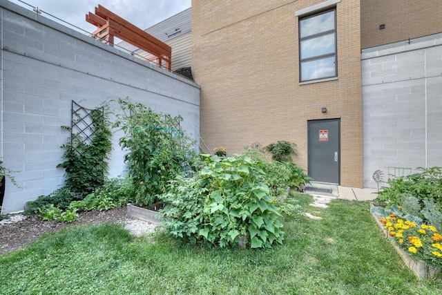 215 E Pleasant St Unit 304, Oconomowoc, WI 53066 - property entrance with brick siding