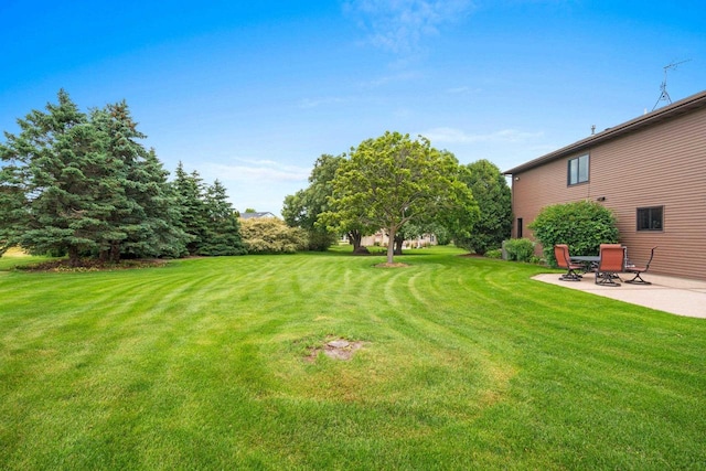 5330 Deer Trail Ln, Sheboygan, WI 53083 - view of grassy yard with a patio area