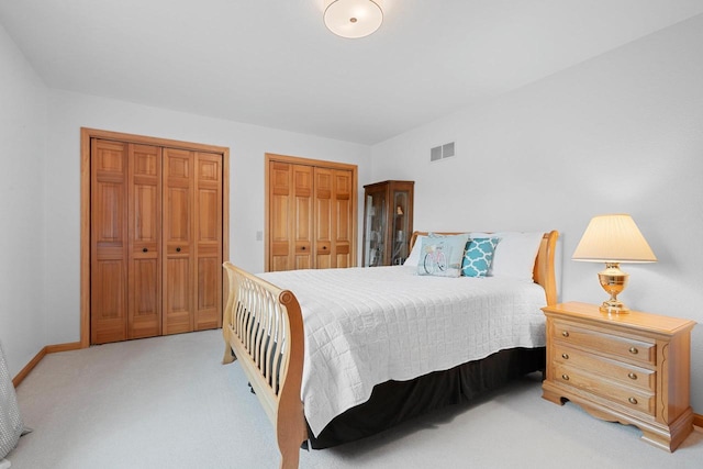5330 Deer Trail Ln, Sheboygan, WI 53083 - bedroom with two closets and light carpet