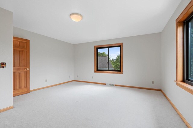5330 Deer Trail Ln, Sheboygan, WI 53083 - unfurnished room with light carpet and baseboards
