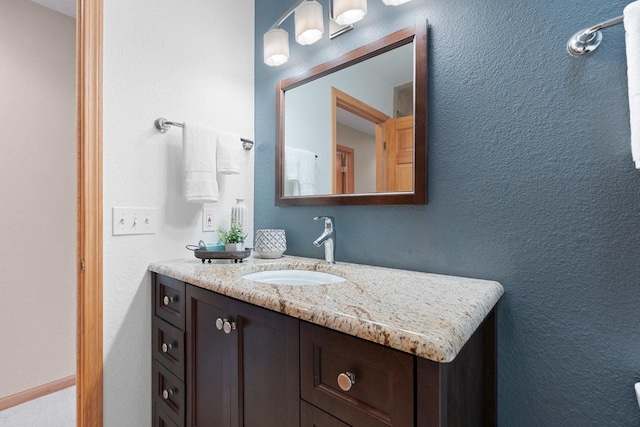5330 Deer Trail Ln, Sheboygan, WI 53083 - bathroom featuring vanity and a textured wall